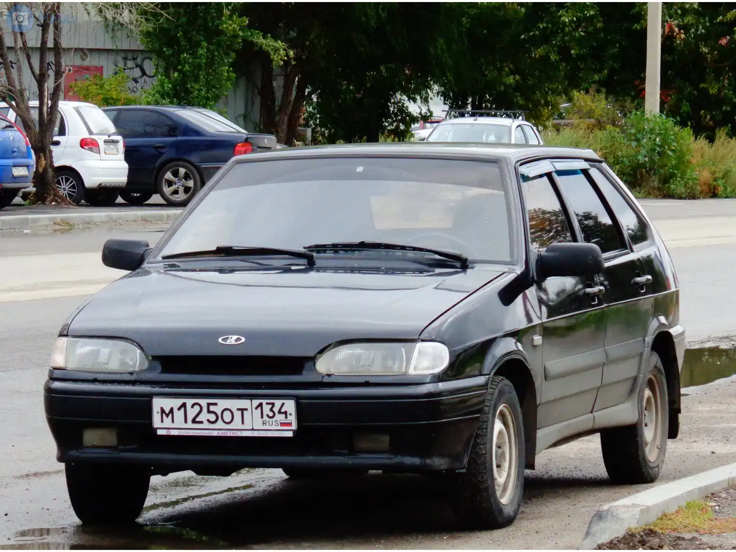 Фото автомобиля LADA 2114 SAMARA, 2008 — госномер М125ОТ134. Цвет: Темно-зеленый