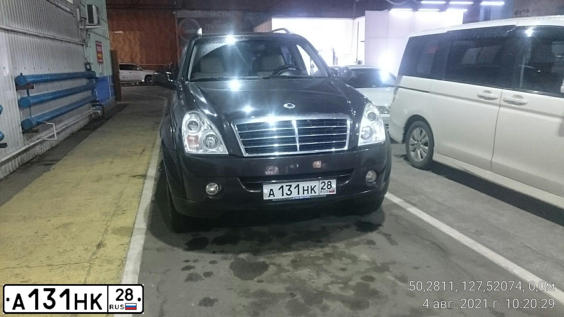 Фото автомобиля SSANGYONG REXTON, 2011 — госномер А131НК28. Цвет: БОРДОВЫЙ