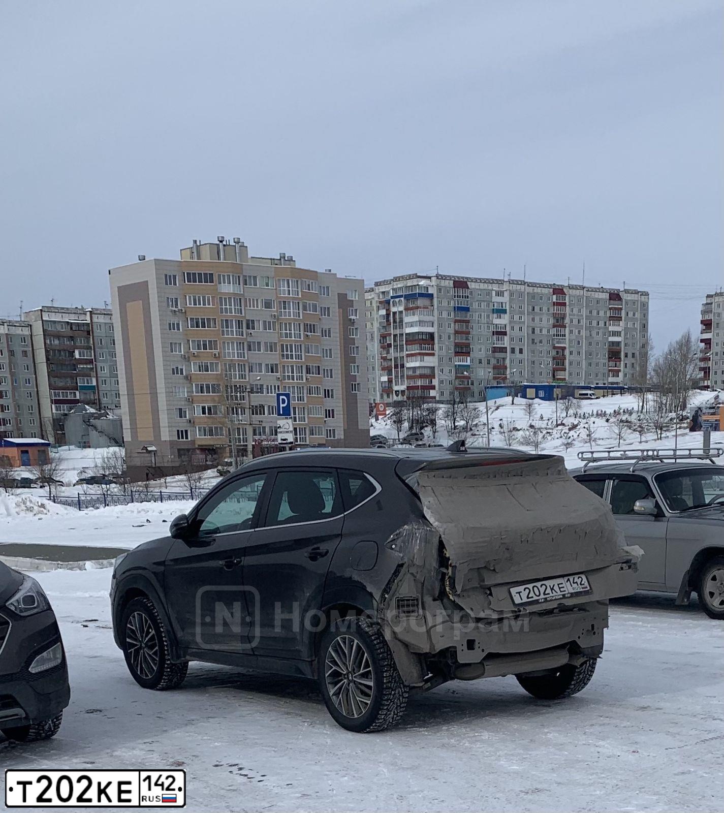 Фото автомобиля HYUNDAI TUCSON, 2018 — госномер Т202КЕ142. Цвет: Коричневый