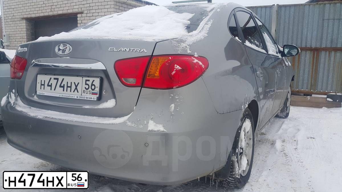 Фото автомобиля HYUNDAI ELANTRA, 2010 — госномер Х029ВВ56. Цвет: СЕРЫЙ