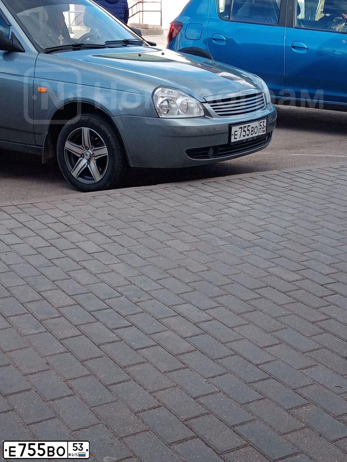 Фото автомобиля LADA 2171 PRIORA, 2011 — госномер Е755ВО53. Цвет: СРЕДНИЙ СЕРО-ЗЕЛЕНЫЙ МЕТ.
