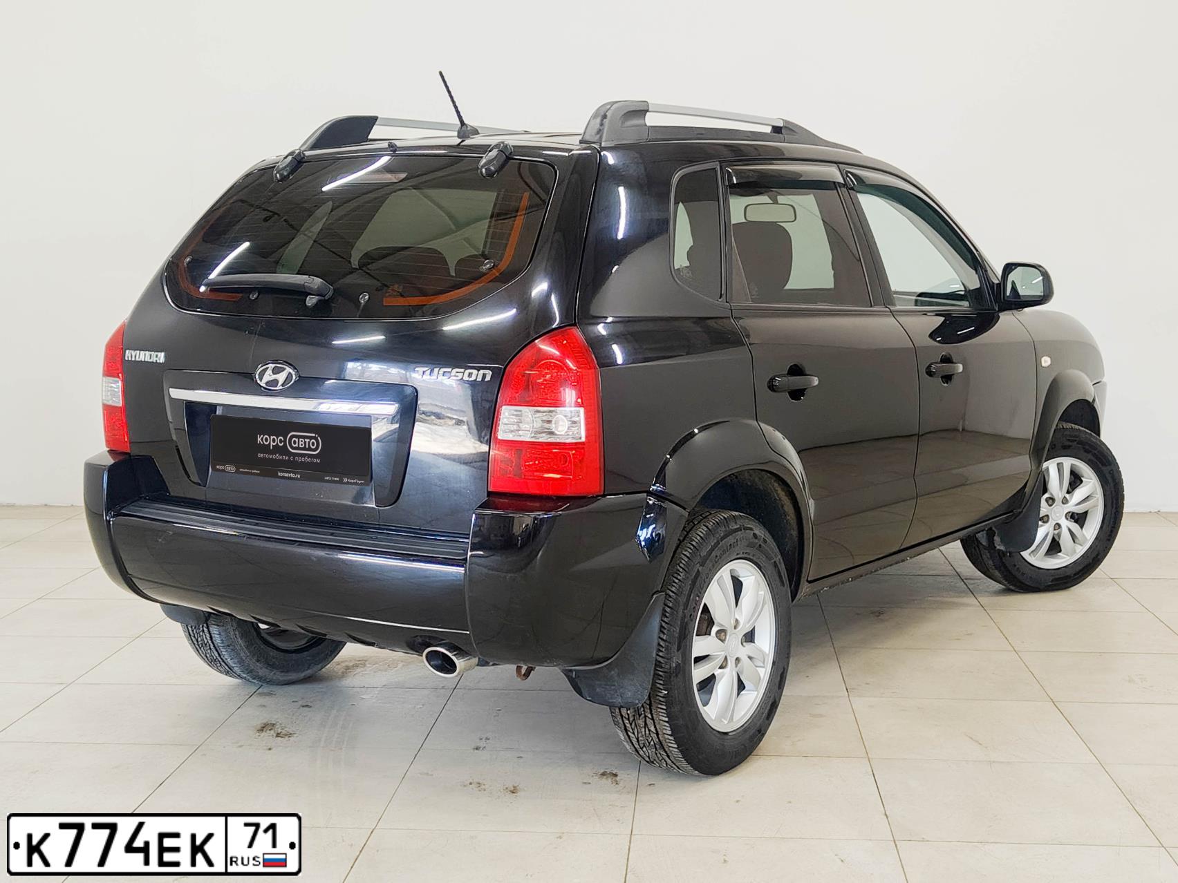 Фото автомобиля HYUNDAI TUCSON, 2008 — госномер Х691КР71. Цвет: ЧЕРНЫЙ