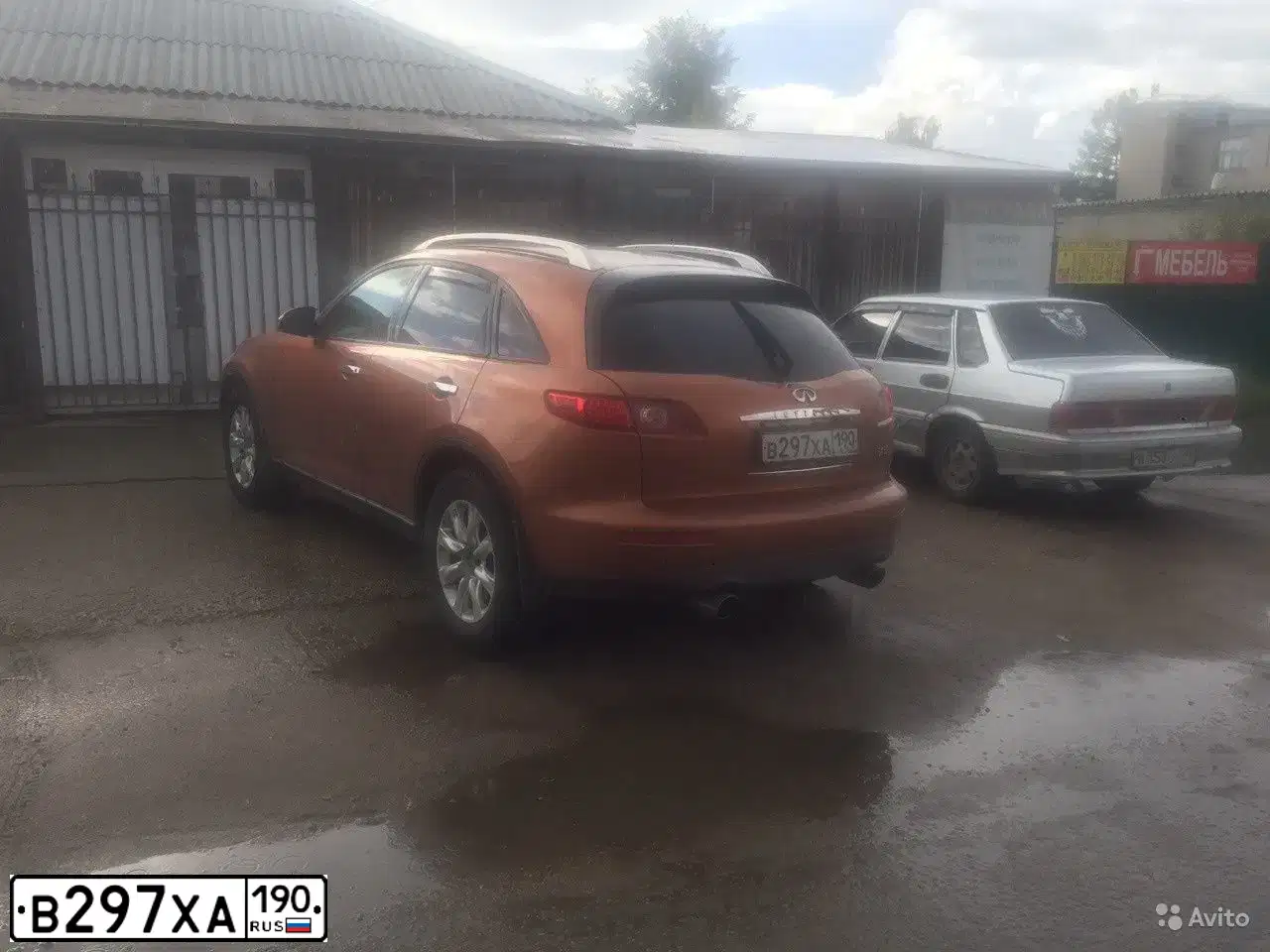 Фото автомобиля INFINITI QX70 /FX/, 2003 — госномер Е054ВВ181. Цвет: ОРАНЖЕВЫЙ
