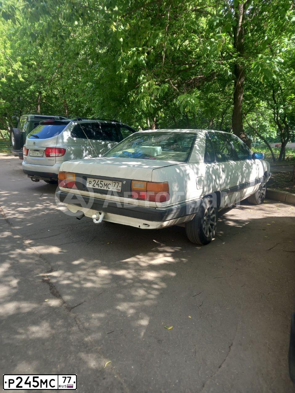 Фото автомобиля AUDI 100, 1990 — госномер Р245МС77. Цвет: БЕЛЫЙ