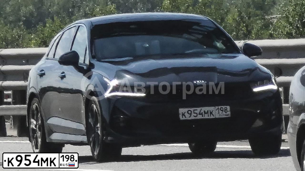 Фото автомобиля KIA K5, 2020 — госномер К954МК198. Цвет: синий