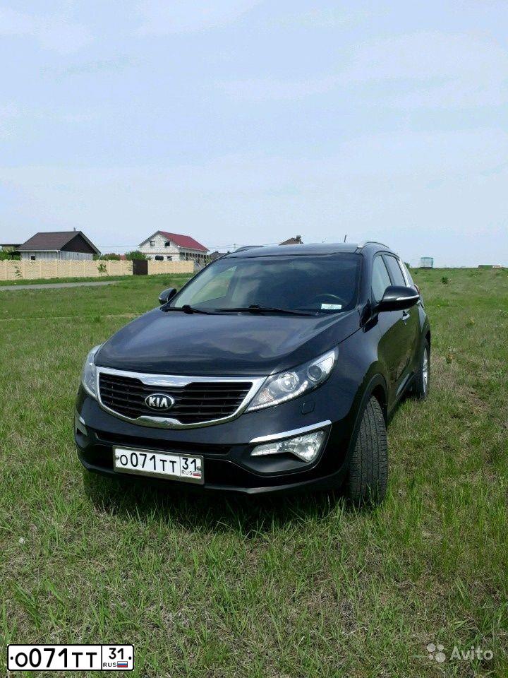 Фото автомобиля KIA SPORTAGE, 2012 — госномер Т114ЕА136. Цвет: ЧЕРНЫЙ ПЕРЛАМУТР