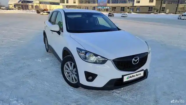 Фото автомобиля MAZDA CX-5, 2014 — госномер Е960СС186. Цвет: БЕЛЫЙ ПЕРЛАМУТР