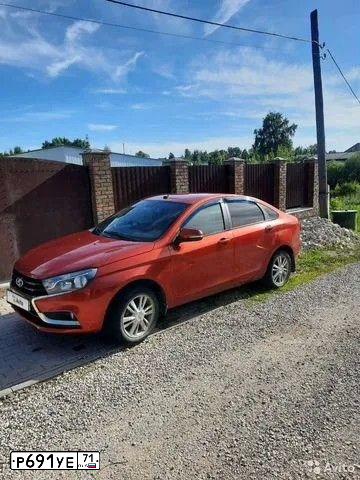 Фото автомобиля LADA VESTA, 2015 — госномер Р691УЕ71. Цвет: Красный