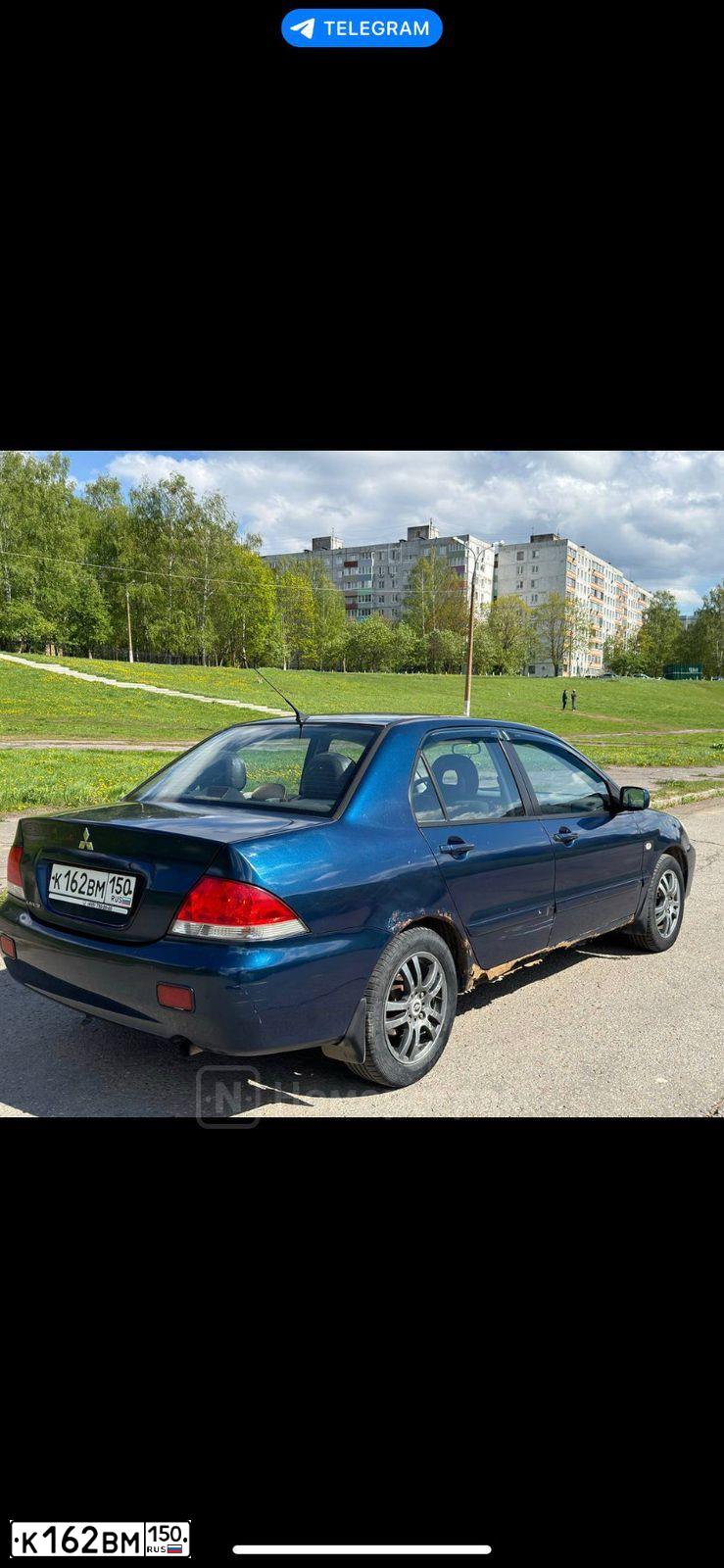 Фото автомобиля MITSUBISHI LANCER, 2006 — госномер Т324СР58. Цвет: СИНИЙ