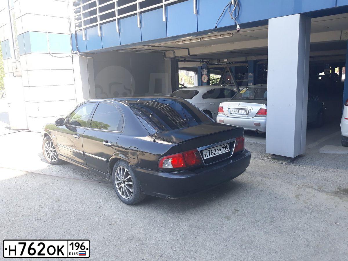 Фото автомобиля KIA MAGENTIS / OPTIMA, 2003 — госномер С410КА196. Цвет: ЧЕРНЫЙ