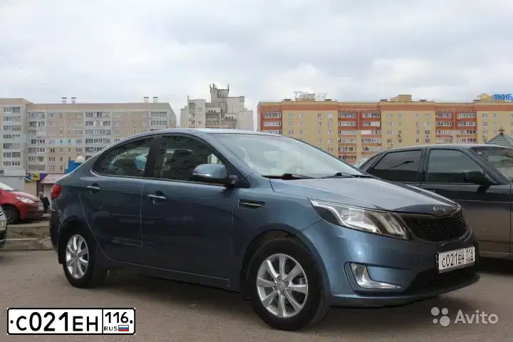 Фото автомобиля KIA RIO, 2012 — госномер С021ЕН116. Цвет: ГОЛУБОЙ