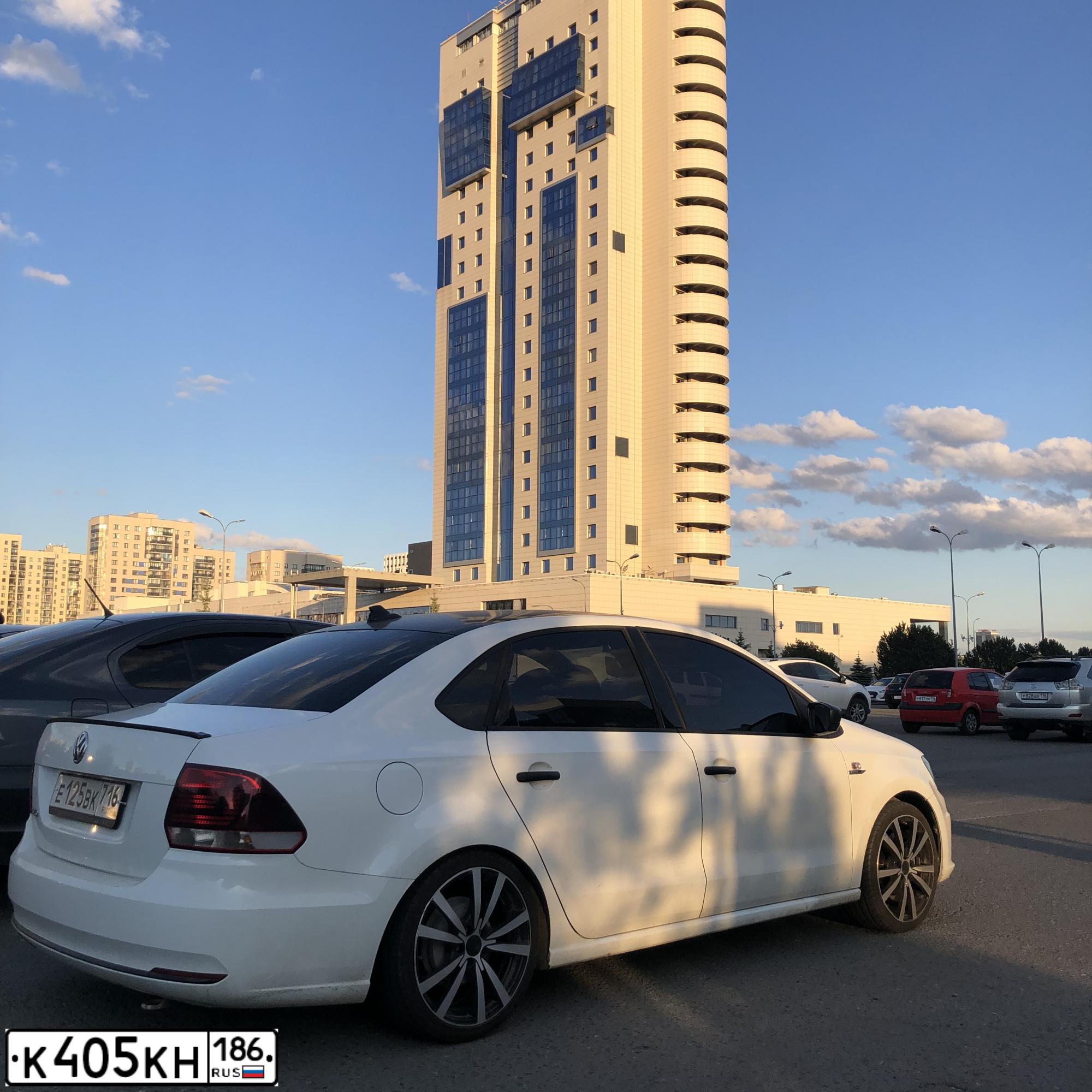 Фото автомобиля NISSAN ALMERA /AVTOVAZ/, 2013 — госномер К405КН186. Цвет: ЧЕРНЫЙ