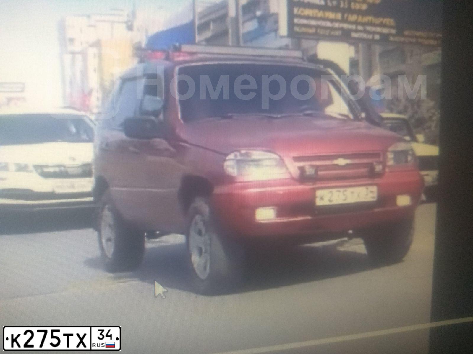 Фото автомобиля CHEVROLET T NIVA, 2007 — госномер А134МО34. Цвет: ЯРКО КРАСНЫЙ МЕТАЛЛИК