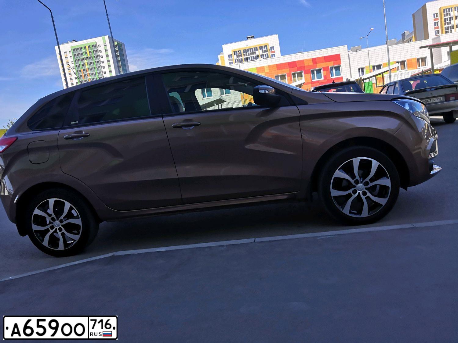 Фото автомобиля LADA XRAY, 2017 — госномер А659ОО716. Цвет: СВЕТЛО-КОРИЧНЕВЫЙ
