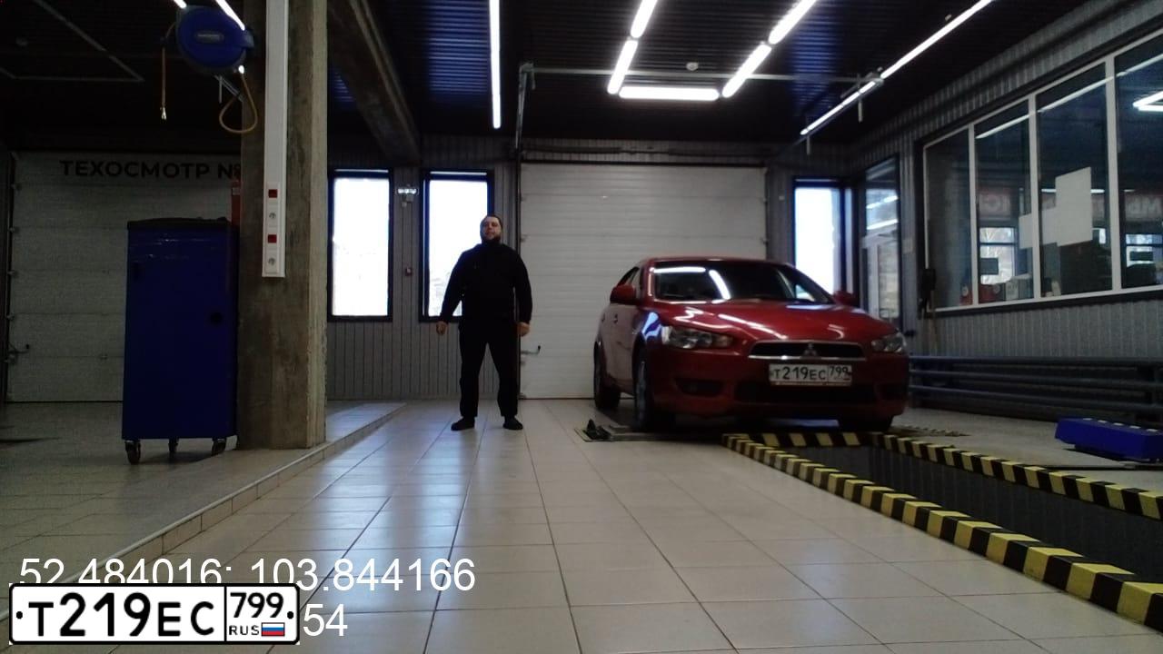 Фото автомобиля MITSUBISHI LANCER, 2007 — госномер Н152ХМ177. Цвет: КРАСНЫЙ