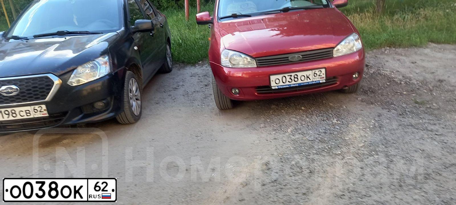 Фото автомобиля LADA 1117 KALINA, 2009 — госномер О038ОК62. Цвет: СЕРЕБРИСТО-КРАСНЫЙ