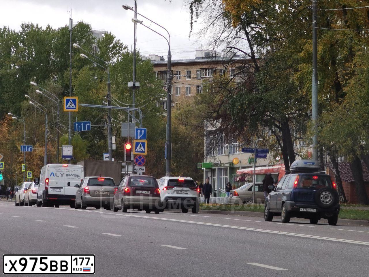 Фото автомобиля MAZDA 3, 2005 — госномер Х975ВВ177. Цвет: ТЕМНО-СЕРЫЙ