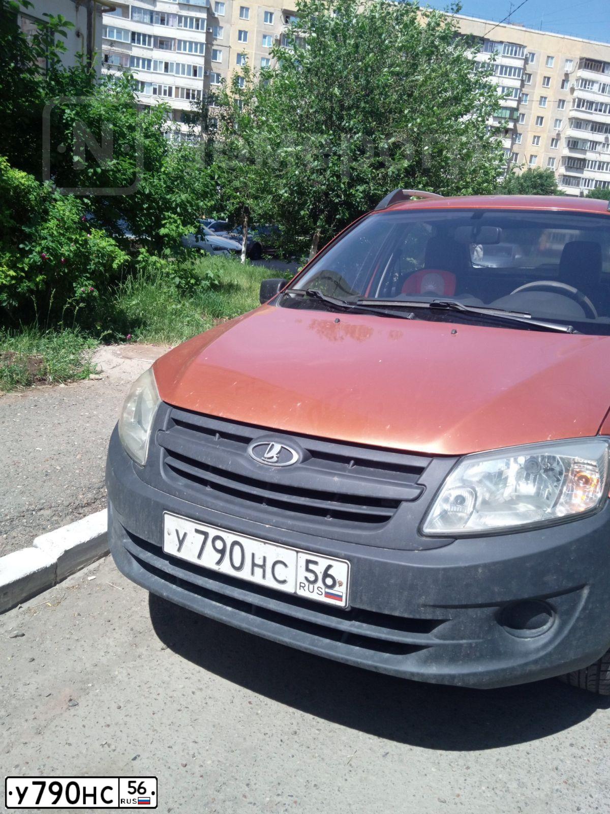 Фото автомобиля LADA 2190 GRANTA, 2014 — госномер У790НС56. Цвет: Оранжевый