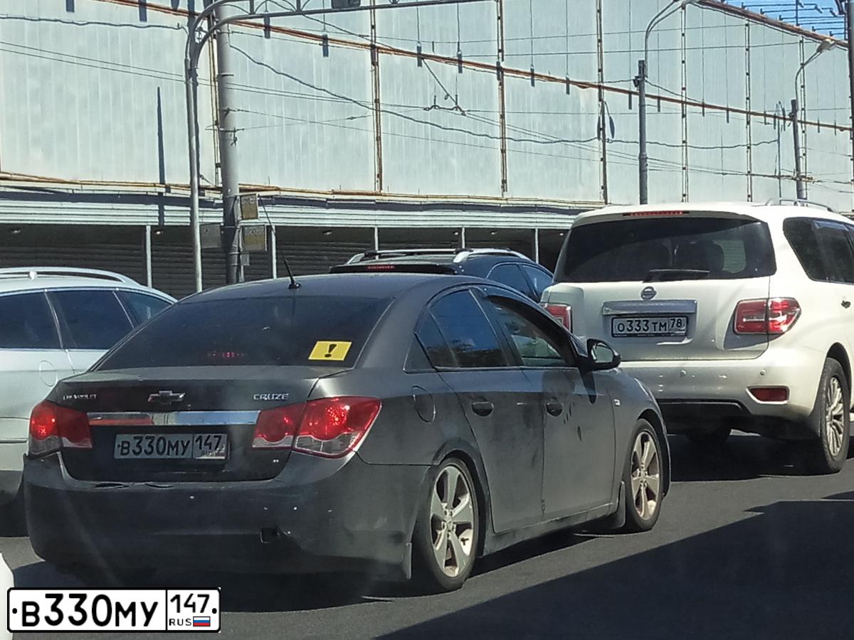 Фото автомобиля CHEVROLET CRUZE, 2010 — госномер О402АВ198. Цвет: СЕРЫЙ МЕТАЛЛИК