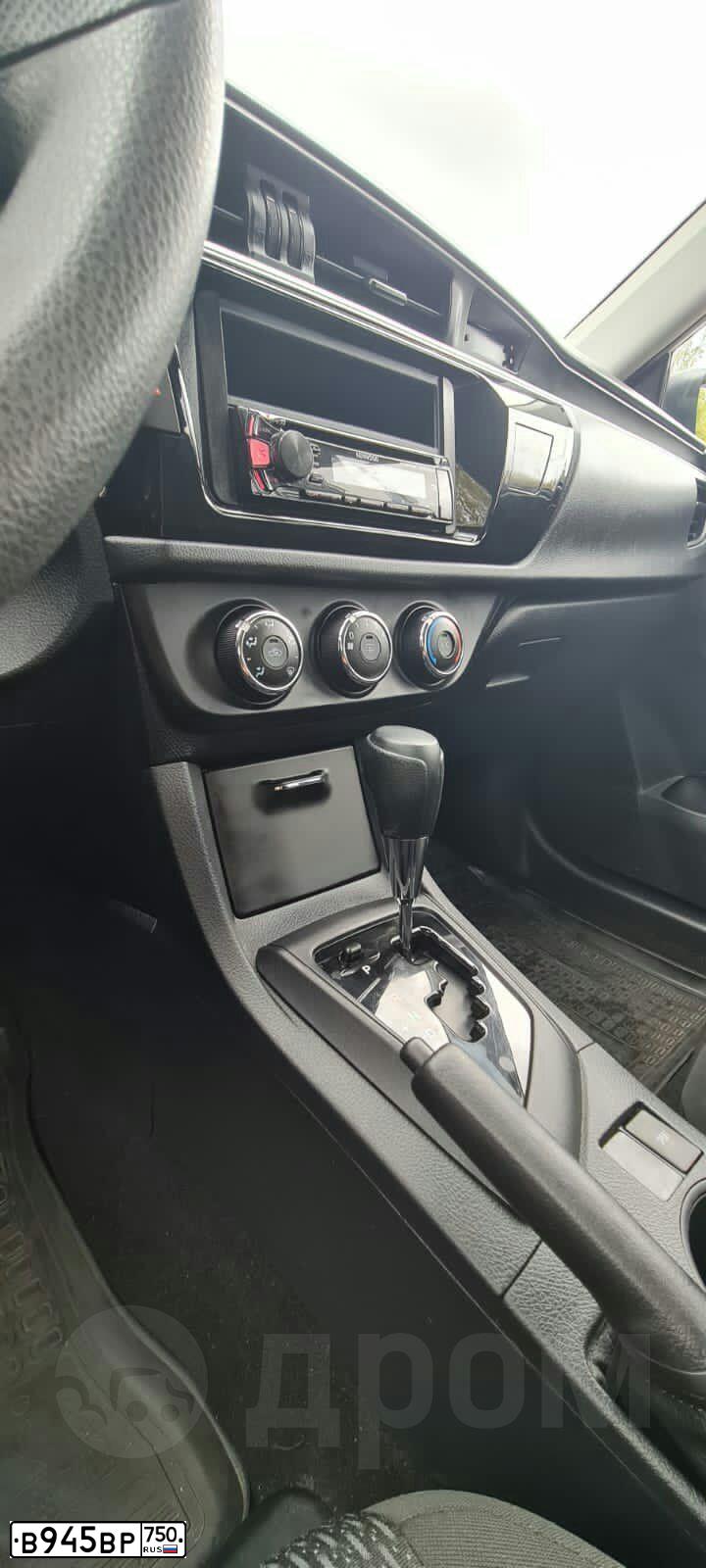Фото автомобиля TOYOTA COROLLA, 2015 — госномер Е067ВР550. Цвет: Белый