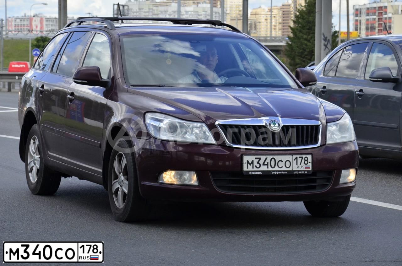 Фото автомобиля ШКОДА ОСТАVIА, 2012 — госномер М340СО178. Цвет: ТЕМНО-БОРДОВЫЙ