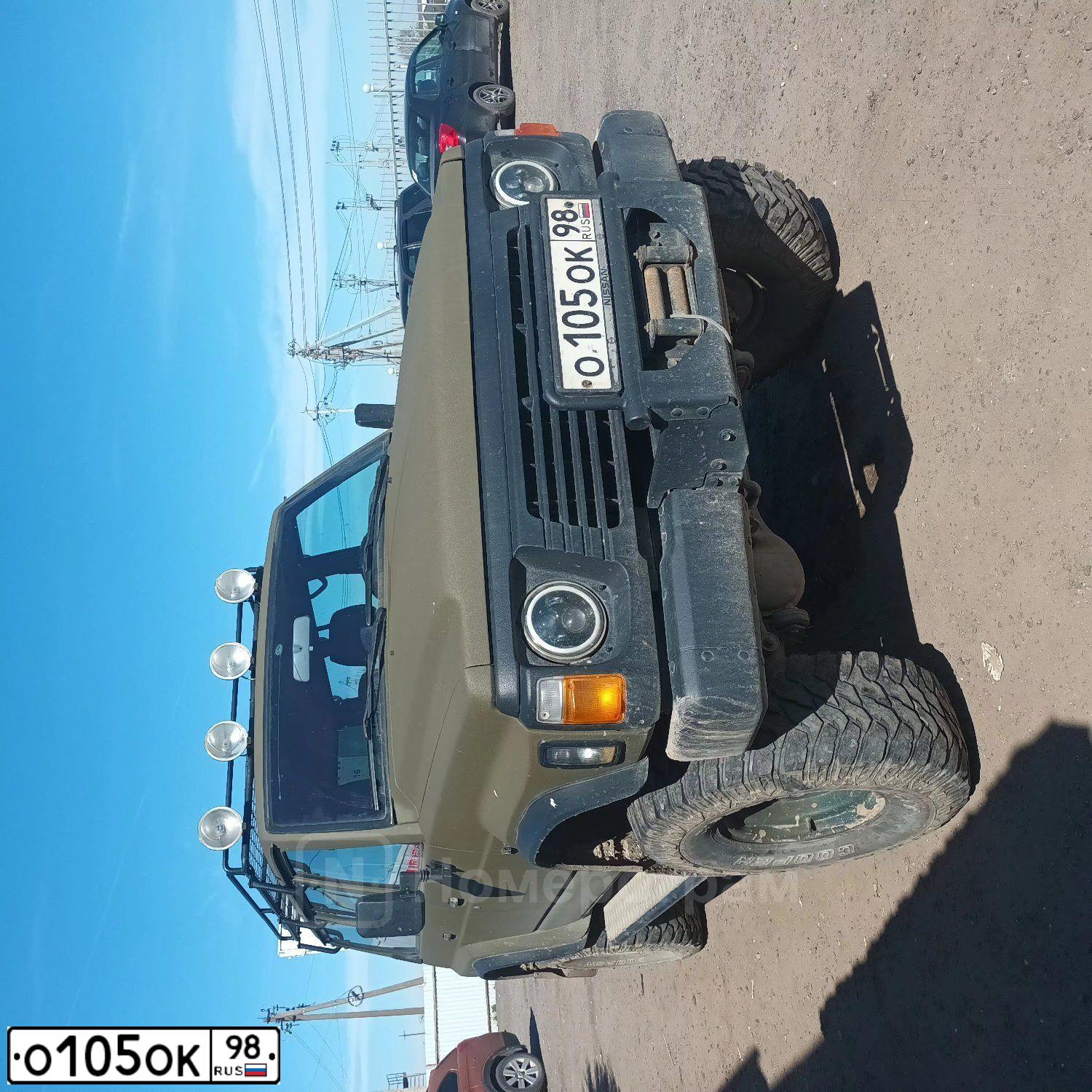 Фото автомобиля NISSAN PATROL, 1996 — госномер О105ОК98. Цвет: ЧЕРНЫЙ