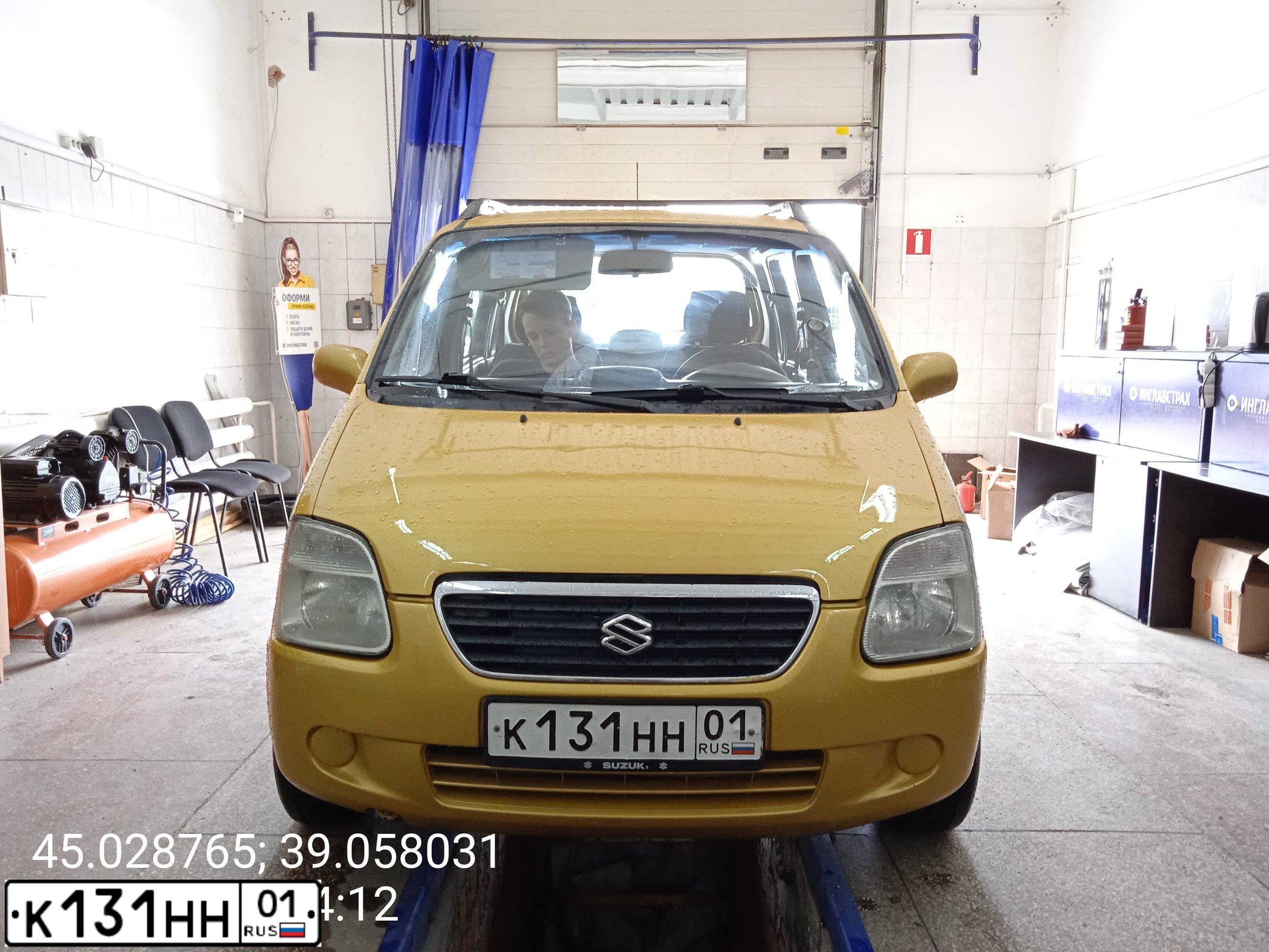 Фото автомобиля SUZUKI WAGON R+, 2003 — госномер Х500РВ55. Цвет: Золотисто-желтый