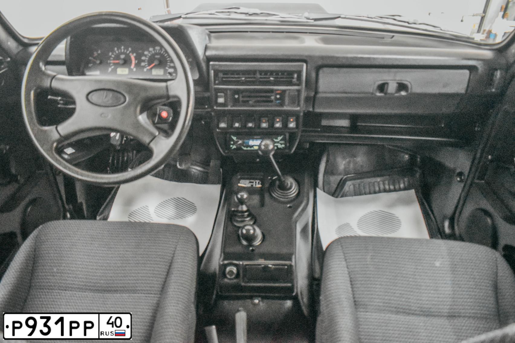 Фото автомобиля LADA 2121 NIVA, 2015 — госномер Х212ВЕ977. Цвет: ТЕМНО-ВИШНЕВЫЙ