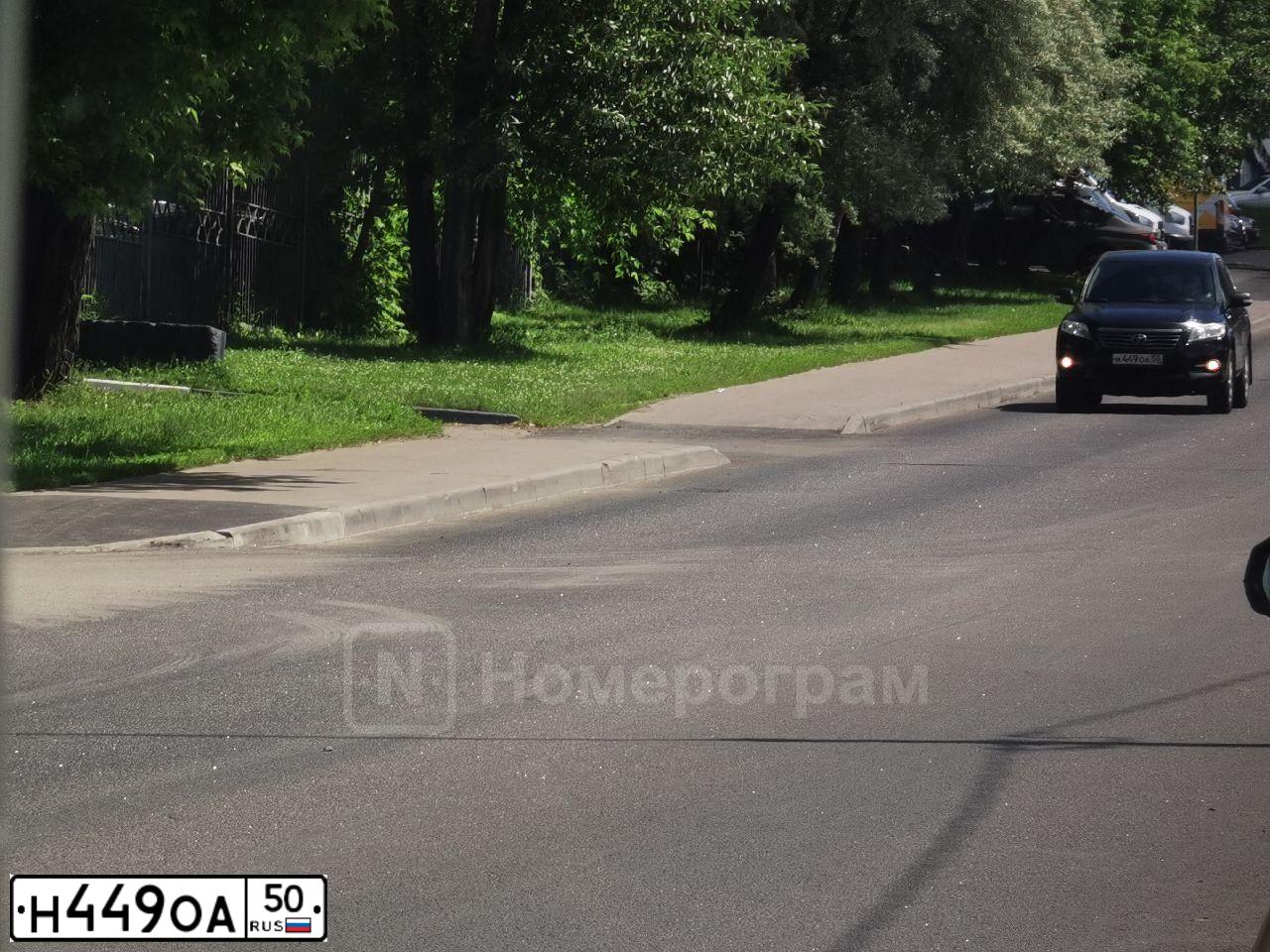 Фото автомобиля TOYOTA RAV4, 2010 — госномер Н449ОА50. Цвет: ЧЕРНЫЙ
