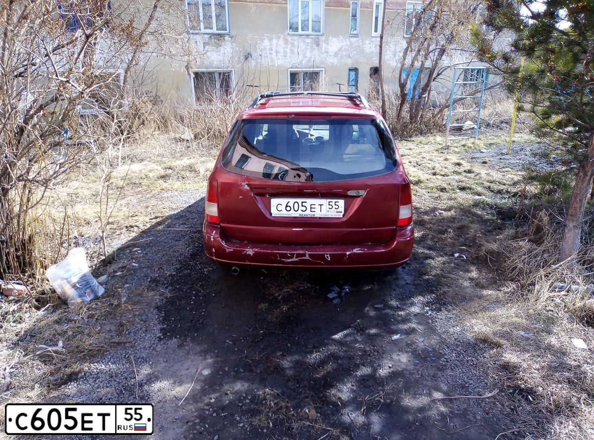 Фото автомобиля FORD FOCUS, 2002 — госномер С605ЕТ55. Цвет: ТЕМНО-КРАСНЫЙ