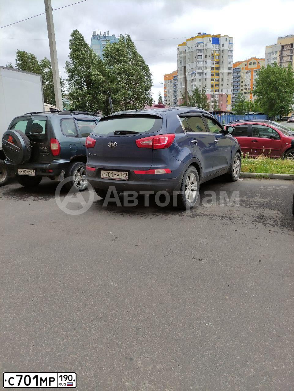 Фото автомобиля KIA SPORTAGE, 2011 — госномер С701МР190. Цвет: СИНИЙ