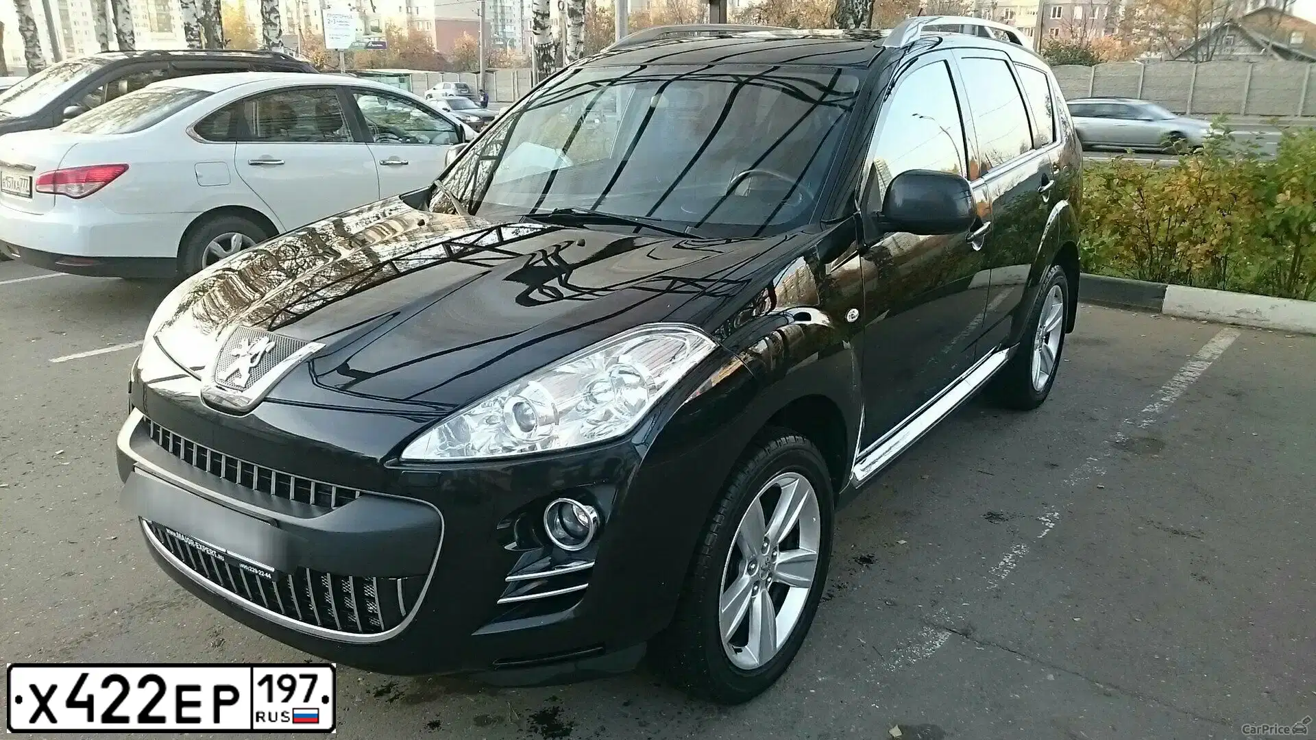 Фото автомобиля PEUGEOT 4007, 2010 — госномер Т404ТК61. Цвет: ЧЕРНЫЙ
