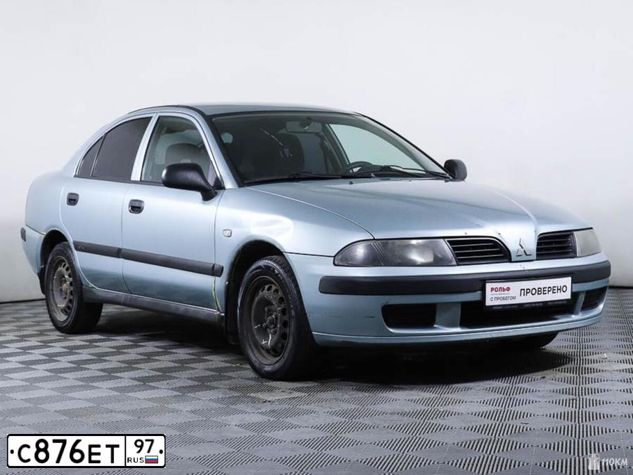 Фото автомобиля MITSUBISHI CARISMA, 2003 — госномер С876ЕТ97. Цвет: СВЕТЛО-СЕРО-ЗЕЛЕНЫЙ