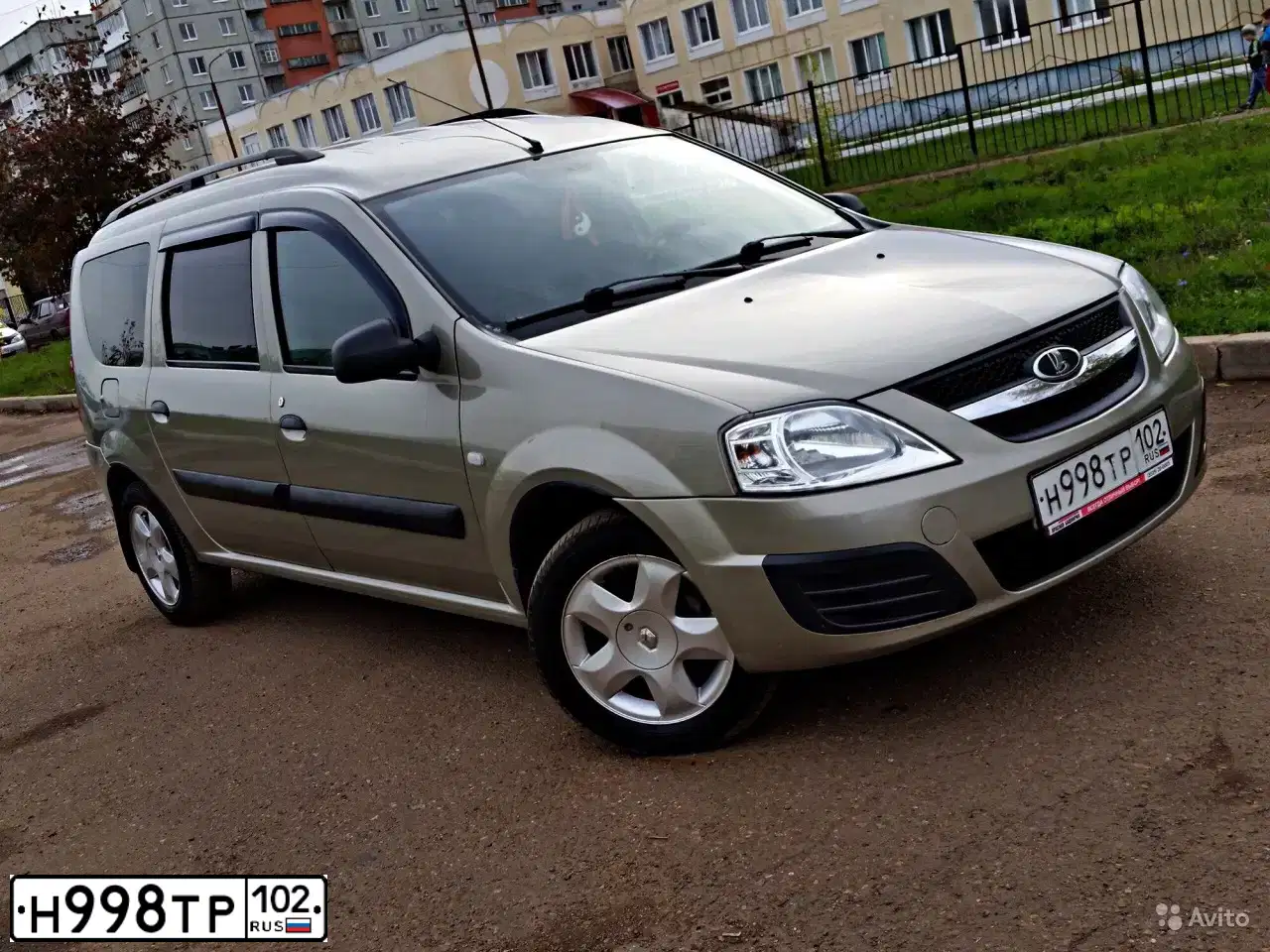 Фото автомобиля ЛАДА KS015L LADA LARGUS, 2012 — госномер Н064СК702. Цвет: СЕРО-БЕЖЕВЫЙ