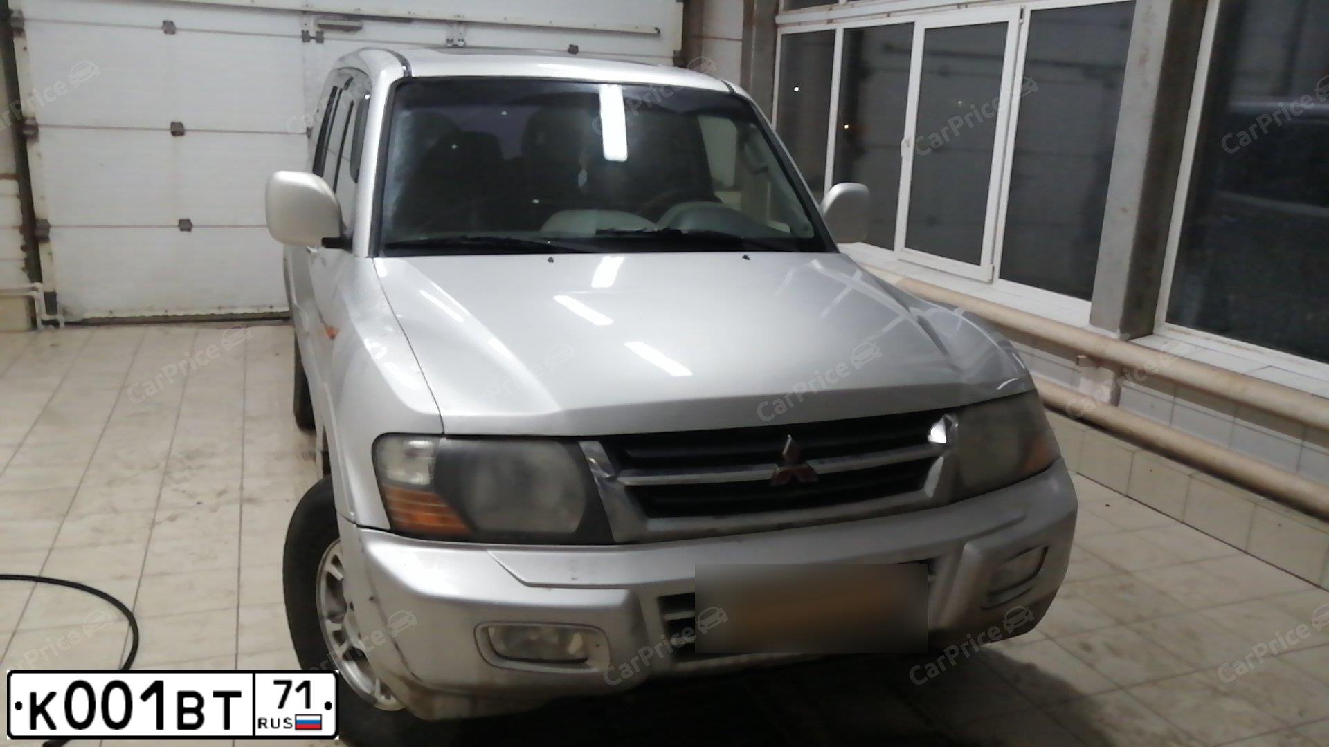 Фото автомобиля MITSUBISHI PAJERO, 2002 — госномер С060СС35. Цвет: СЕРЕБРИСТЫЙ