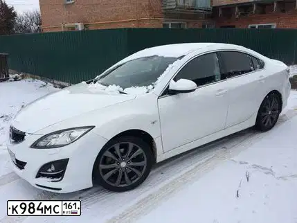 Фото автомобиля MAZDA 6, 2010 — госномер К984МС161. Цвет: БЕЛЫЙ