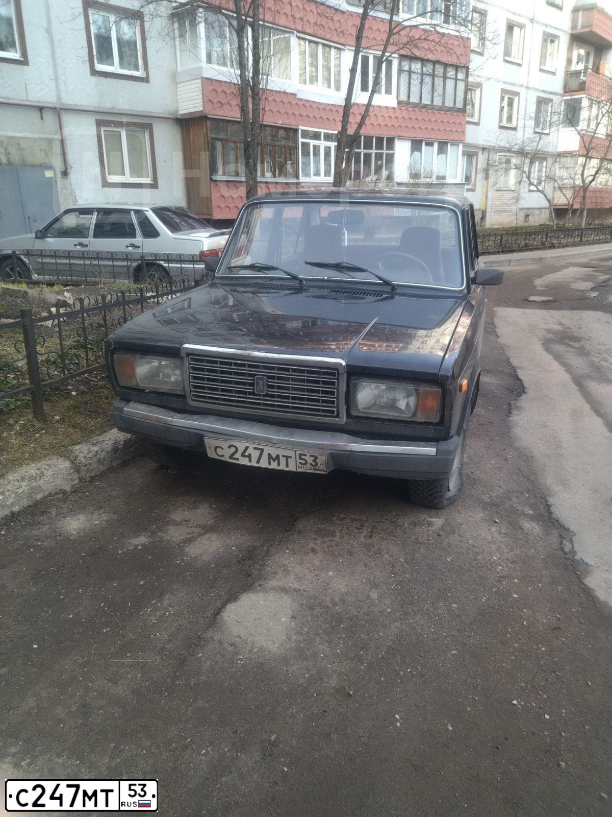 Фото автомобиля LADA 2107, 2011 — госномер С247МТ53. Цвет: СИНЕ-ЧЕРНЫЙ