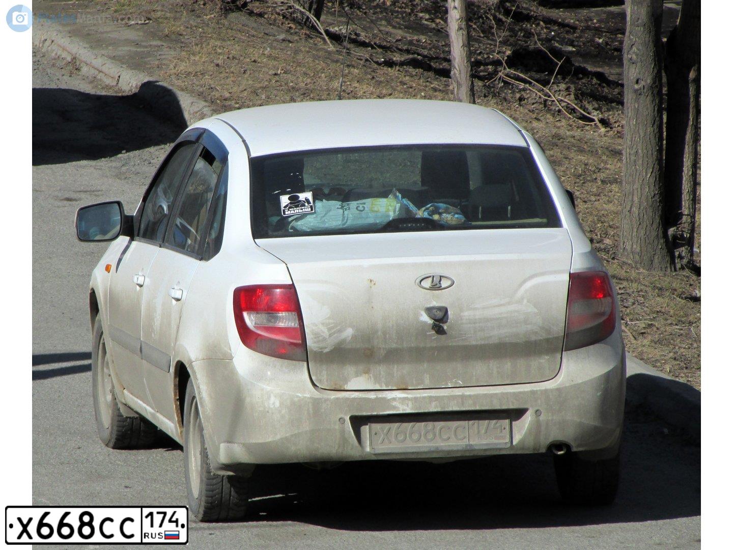 Фото автомобиля LADA 2190 GRANTA, 2013 — госномер Х668СС174. Цвет: БЕЛЫЙ