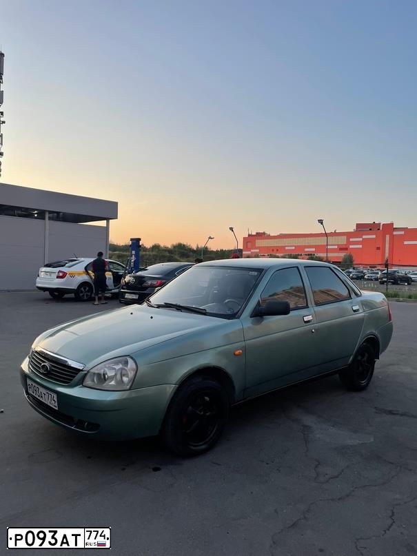Фото автомобиля LADA 2170 PRIORA, 2007 — госномер Е700МЕ164. Цвет: СРЕДНИЙ СЕРО-ЗЕЛЕНЫЙ МЕТ
