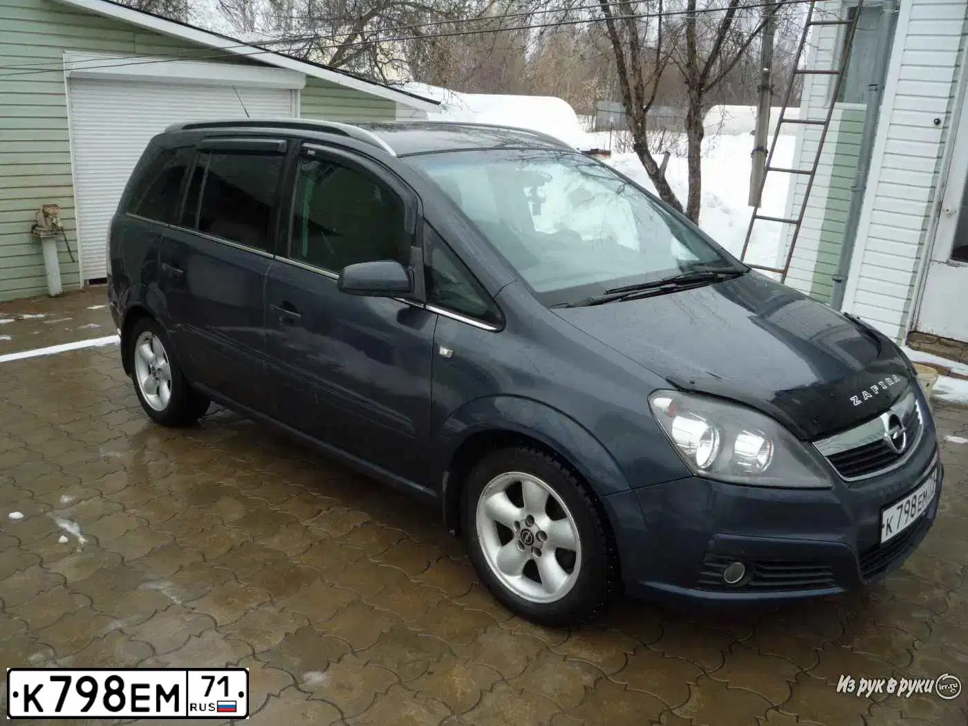 Фото автомобиля OPEL ZAFIRA, 2006 — госномер Е223АХ761. Цвет: ТЕМНО-СЕРЫЙ