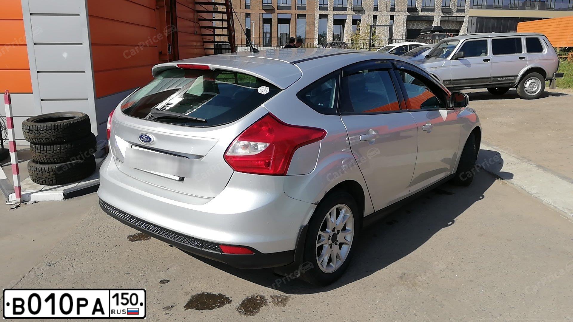 Фото автомобиля FORD FOCUS, 2012 — госномер Х902ТК73. Цвет: Серебристый