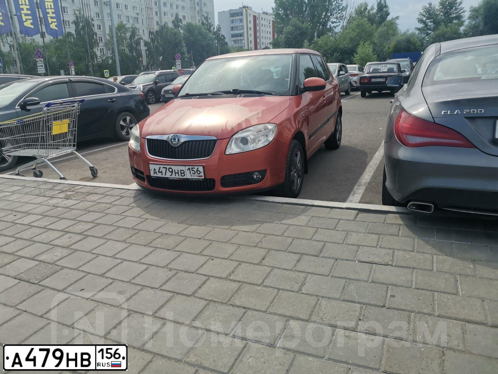 Фото автомобиля SKODA FABIA, 2010 — госномер А479НВ156. Цвет: ОРАНЖЕВО-КРАСНЫЙ