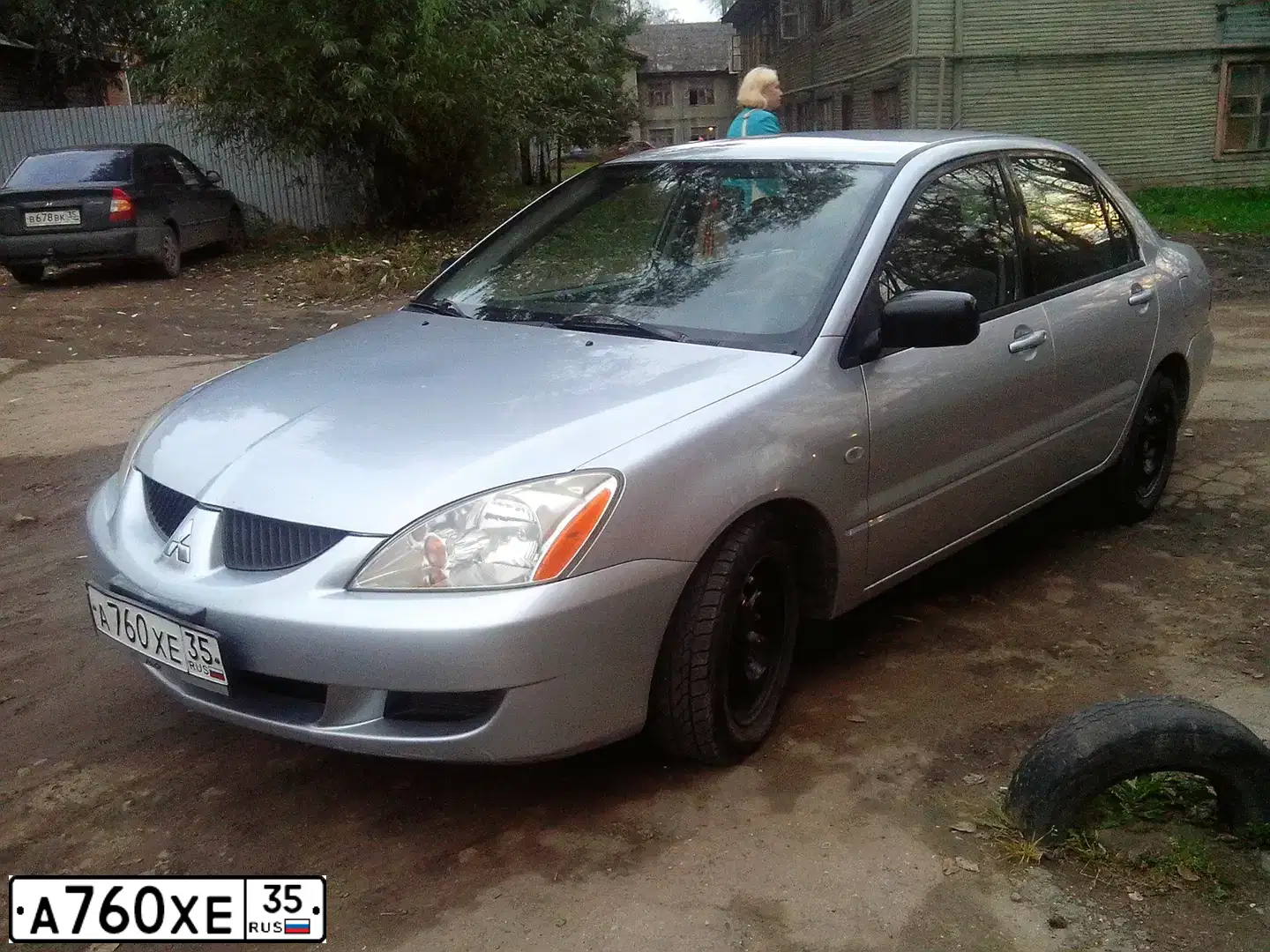Фото автомобиля MITSUBISHI LANCER, 2004 — госномер А760ХЕ35. Цвет: Серебристый