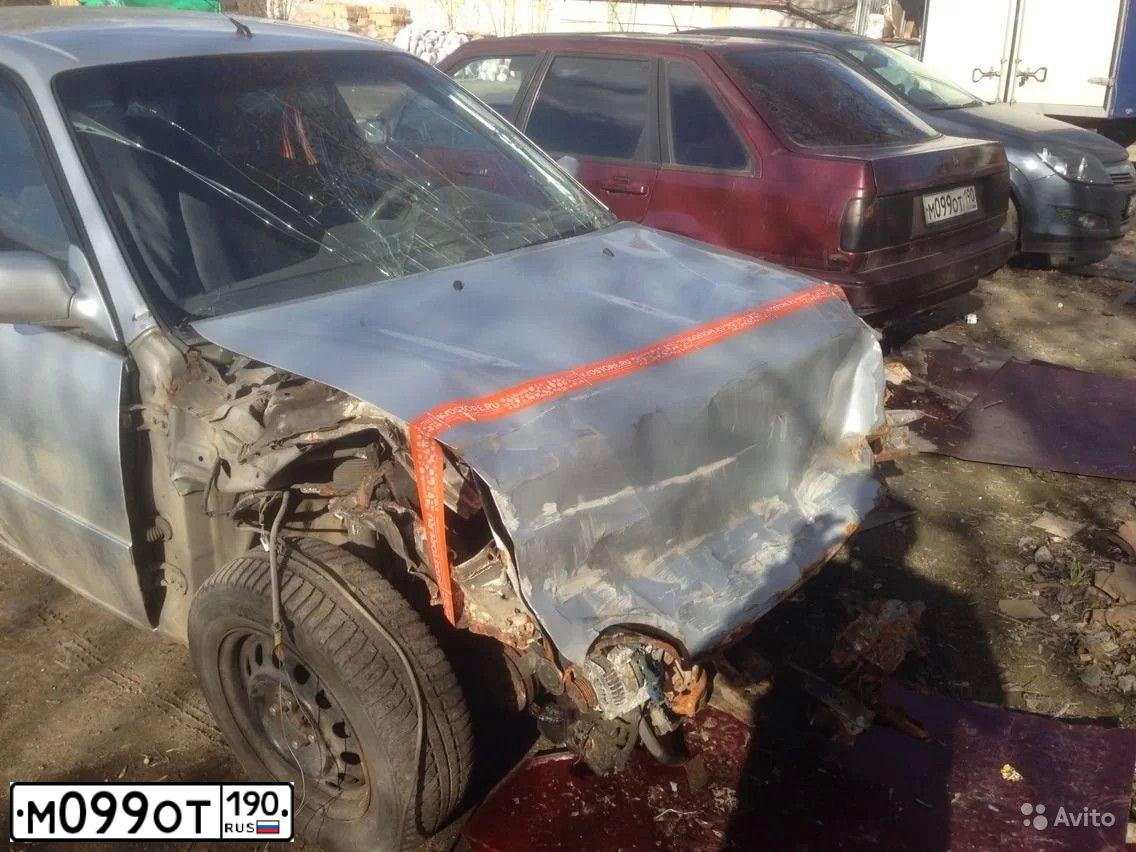 Фото автомобиля VOLVO 440, 1991 — госномер М099ОТ190. Цвет: КРАСНЫЙ ТЕМНЫЙ