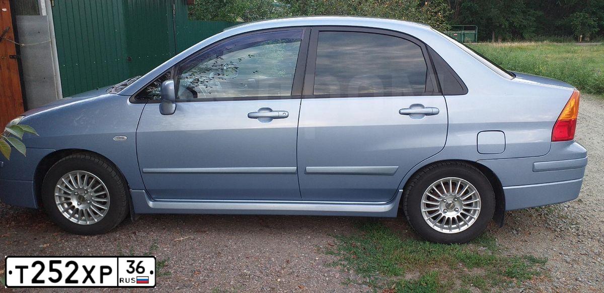 Фото автомобиля SUZUKI LIANA, 2006 — госномер Р657ЕХ46. Цвет: синий