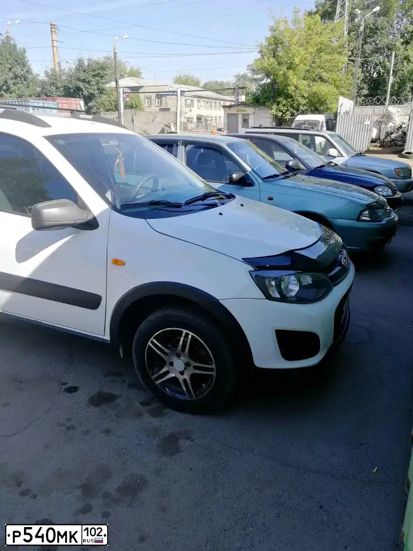 Фото автомобиля LADA 2194 KALINA, 2013 — госномер О835УР174. Цвет: Белый