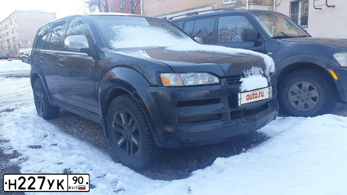 Фото автомобиля ISUZU AXIOM, 2002 — госномер М552УУ35. Цвет: ЧЕРНЫЙ