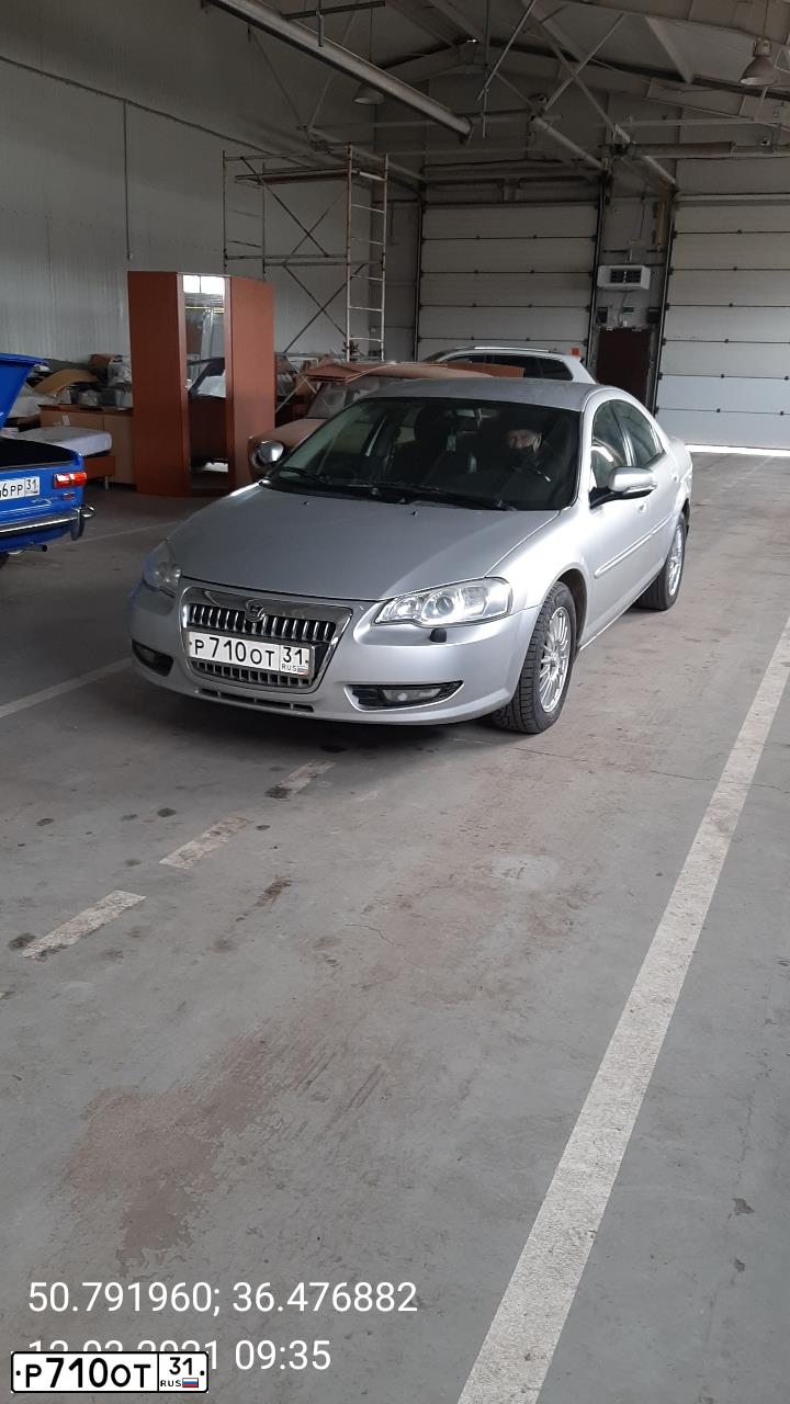 Фото автомобиля SUBARU IMPREZA, 1997 — госномер Р710ОТ31. Цвет: Красный