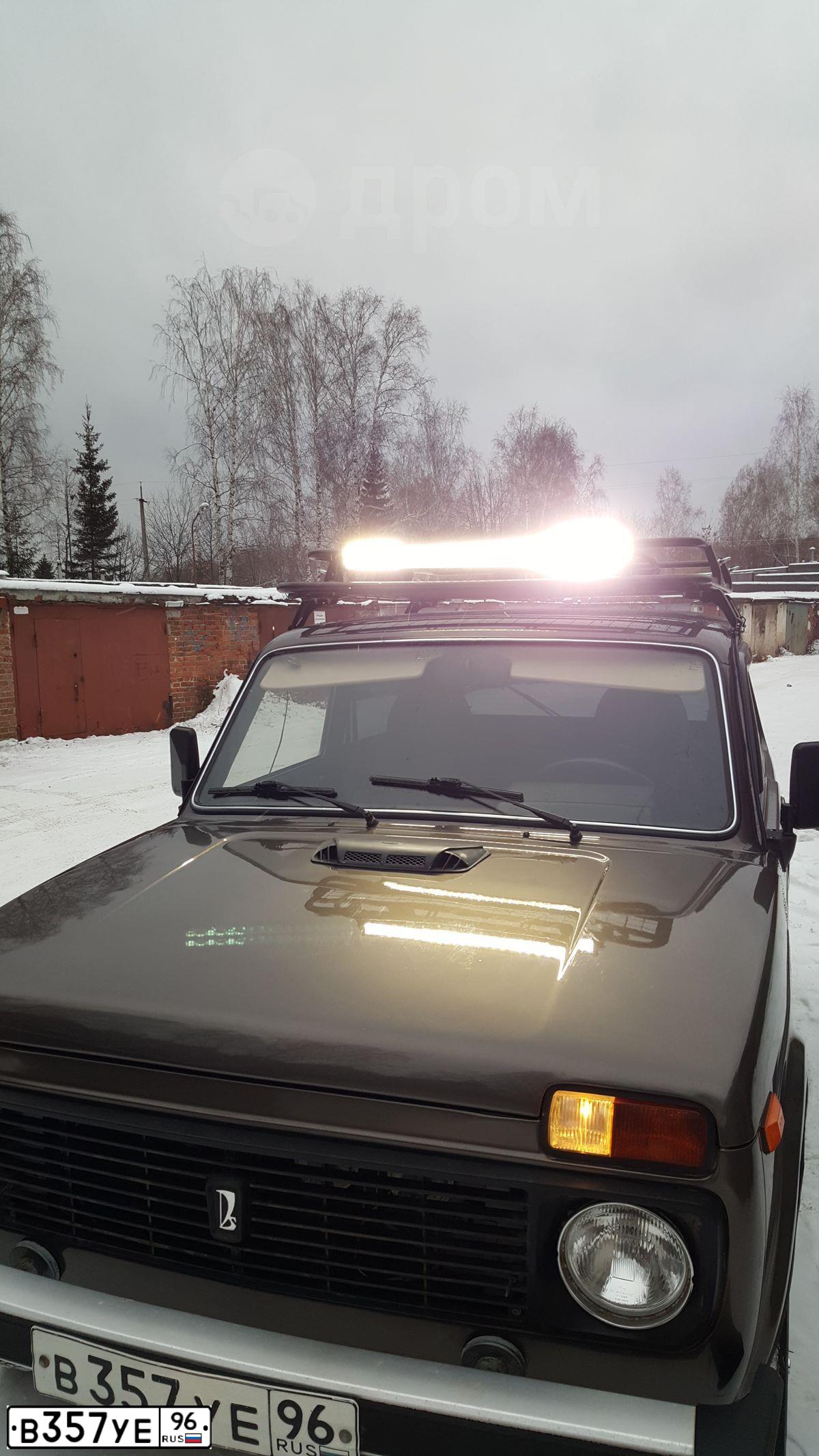 Фото автомобиля LADA 2121 NIVA, 2001 — госномер В357УЕ96. Цвет: Коричневый