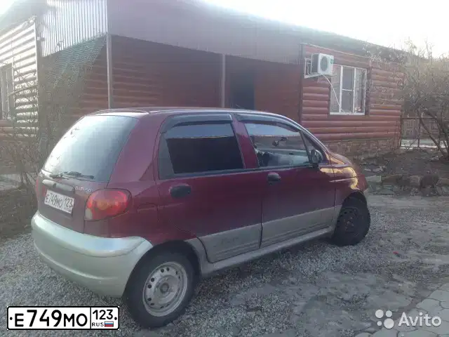 Фото автомобиля DAEWOO MATIZ, 2010 — госномер Е749МО123. Цвет: СПЕЛАЯ ВИШНЯ